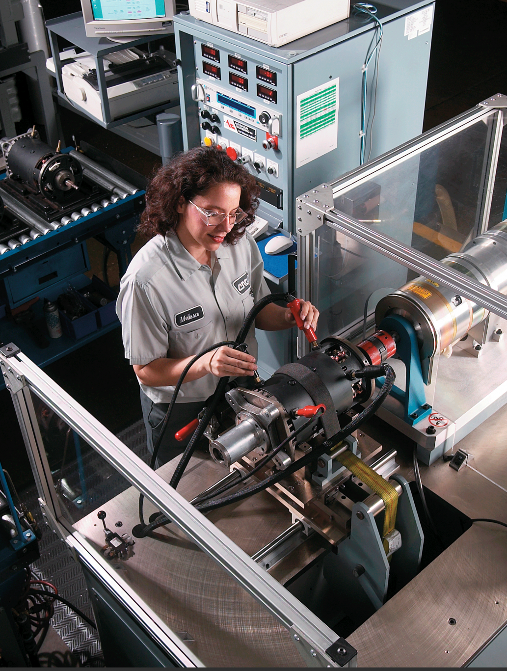 woman working at an industrial machine